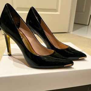Ted Baker London black patent leather heels with gold detail